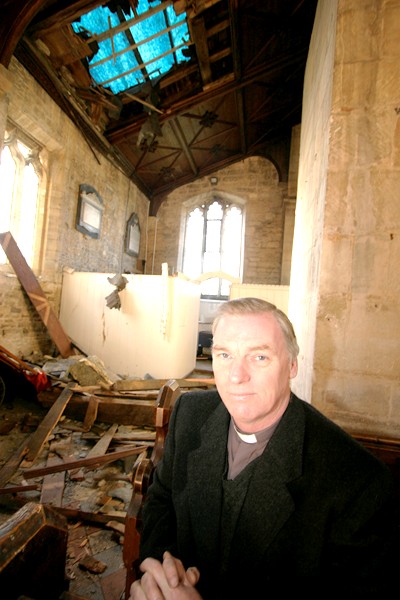Vicar and church damage