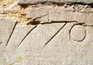 Inscription on wall in Church Walk