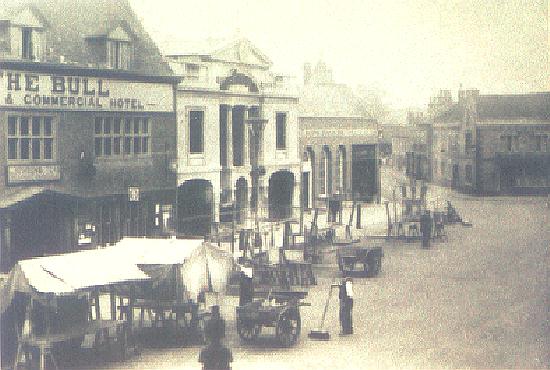 Market Place clearing up after business circa 1920