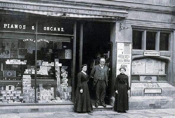 John Thomas Pearce, postmaster, and daughters
