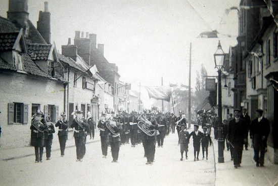 The Volunteers parading down South Street